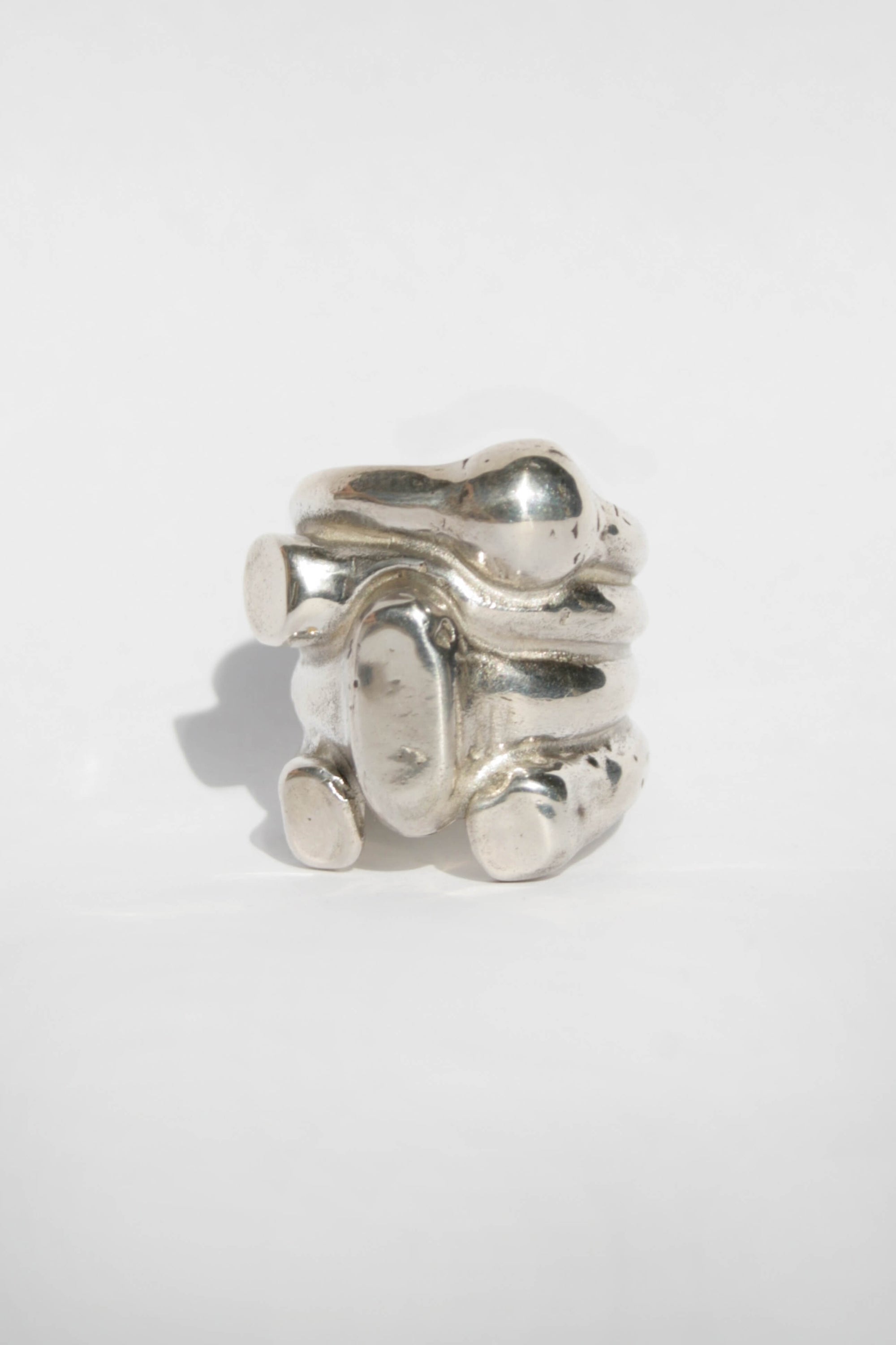 stackable sterling silver ring on a white backdrop